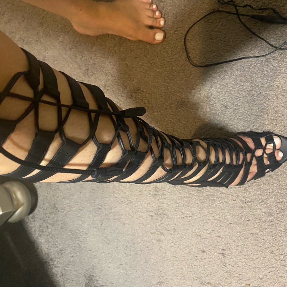 Sexy lace up boots. Never worn. True to size.